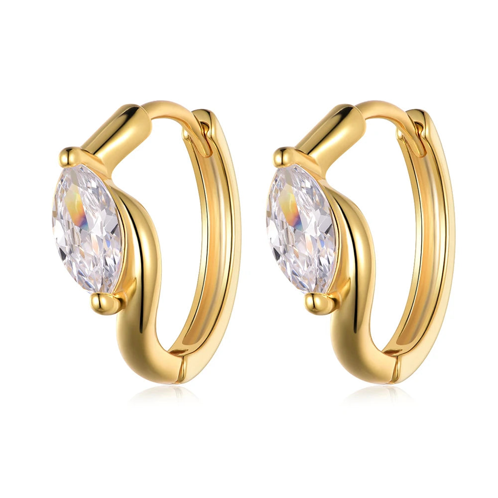 Gold hoop earrings with moissanite gemstones on a white background