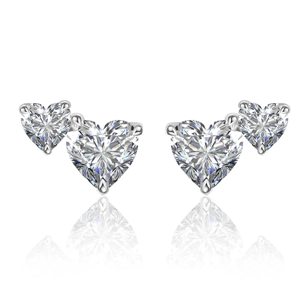 Heart-shaped moissanite diamond earrings on a white background