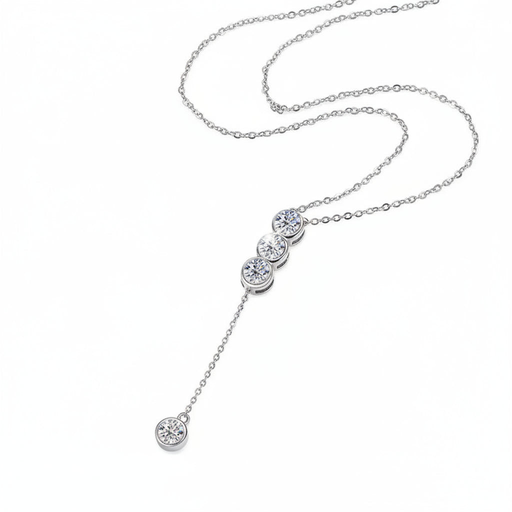 Silver necklace with round-shaped pendant on a white background