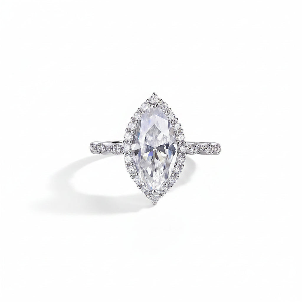 Moissanite diamond ring with a marquise-shaped center stone on a white background