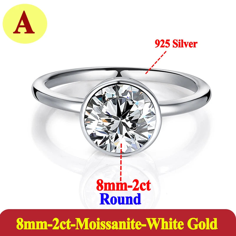 Silver ring with round Moissanite stone labeled '925 Silver' and '8mm-2ct Round'.