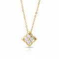 Gold necklace with a moissanite diamond pendant on a white background