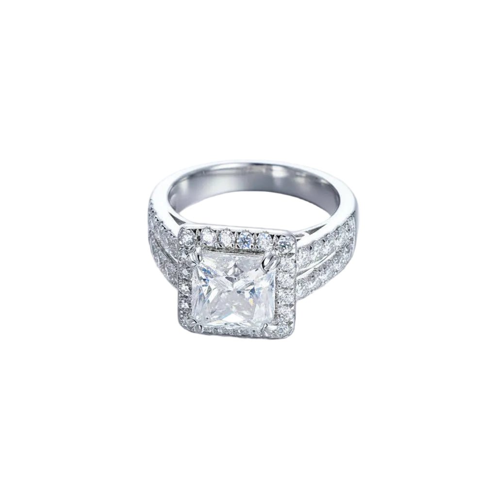 Silver ring with a large diamond on a white background