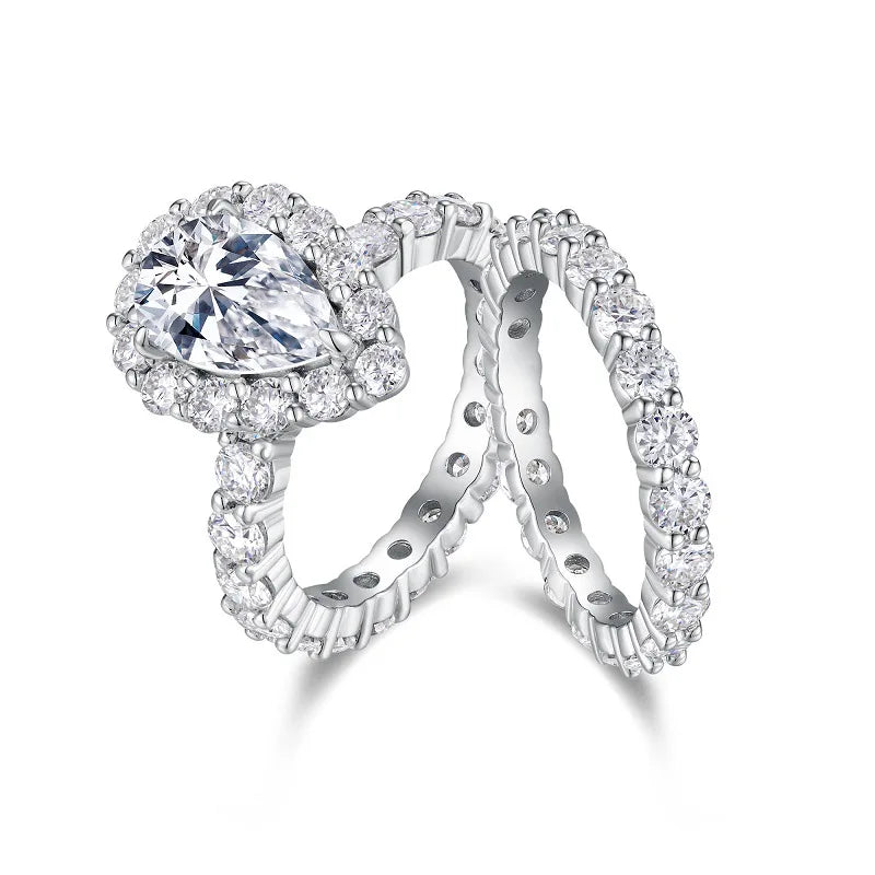 Moissanite ring set on a white background