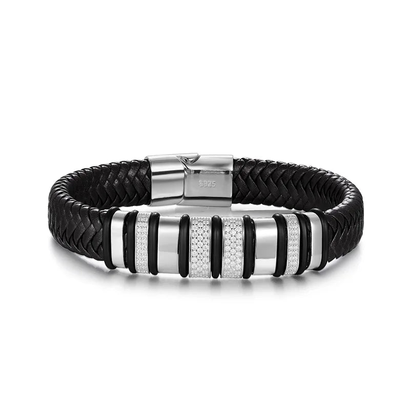 Black braided leather bracelet with silver accents on a white background