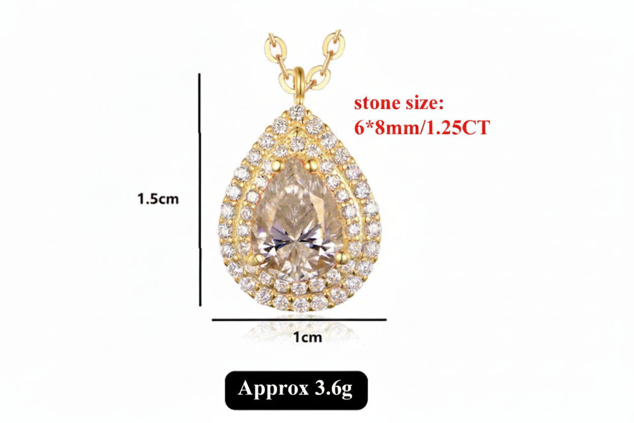 Gold necklace with teardrop-shaped moissanite pendant, showing measurements on a white background.