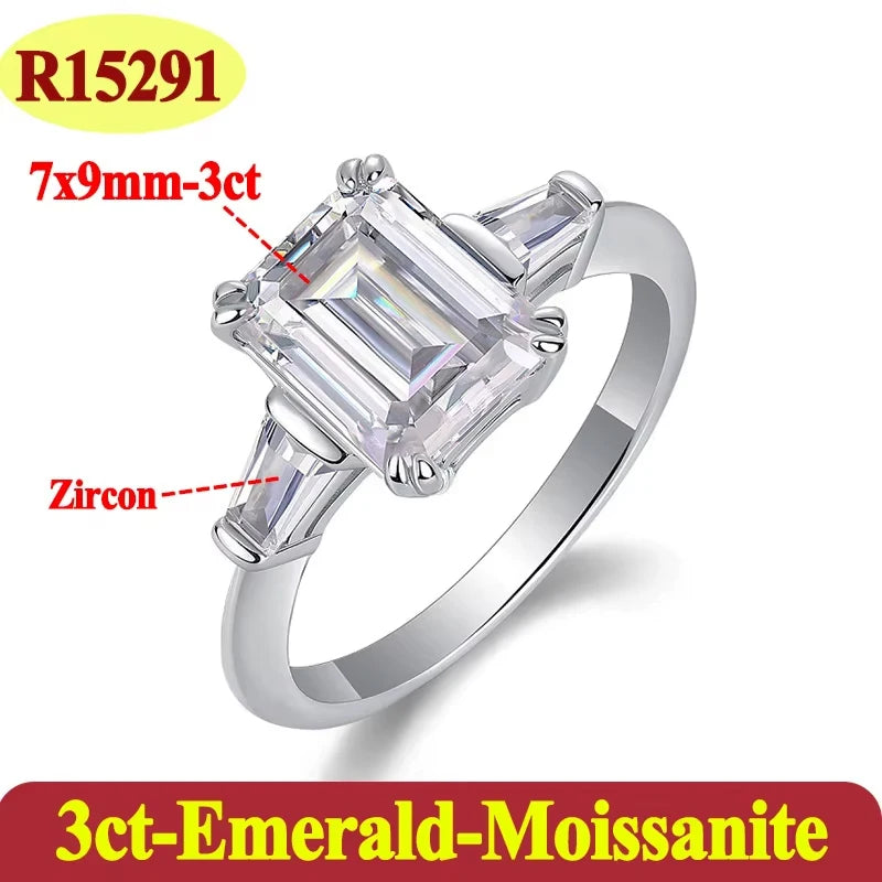 Silver ring with emerald-cut moissanite stone on a white background