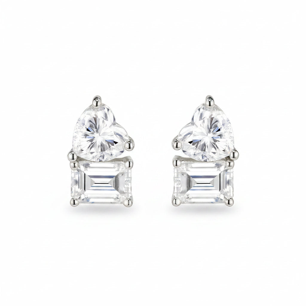 Pair of diamond stud earrings on a white background