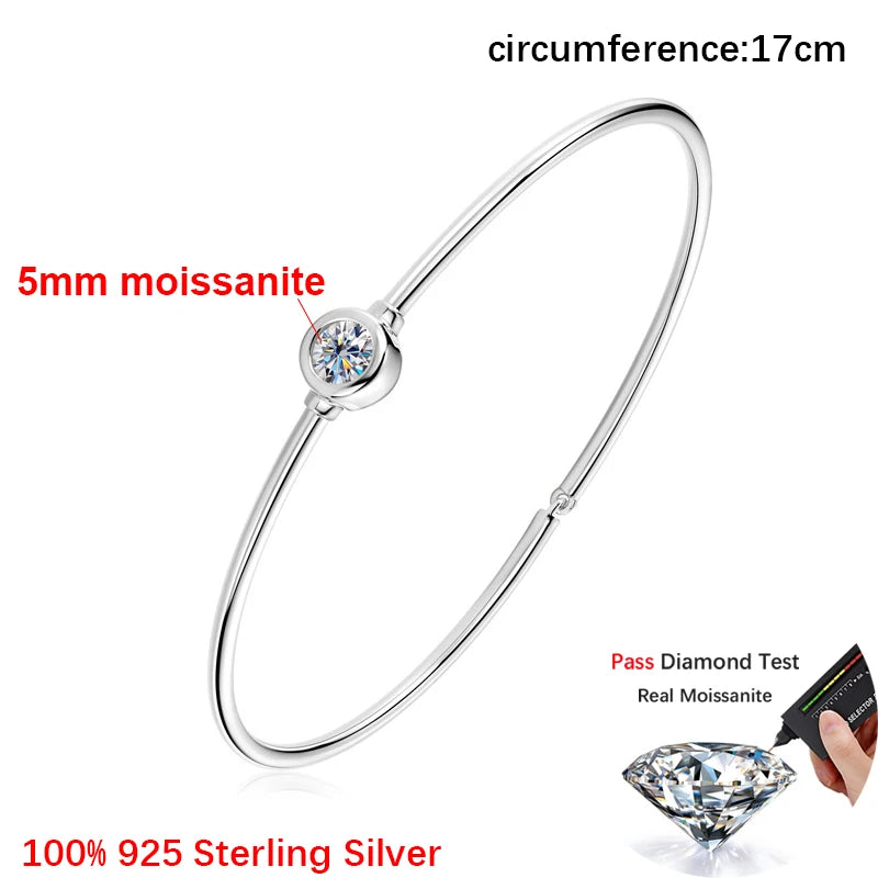 Silver bracelet with moissanite gemstone on a white background