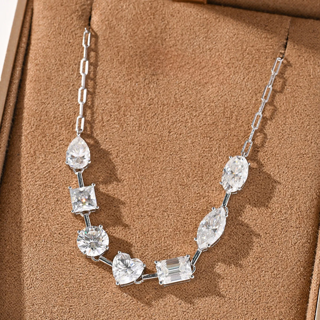 Moissanite diamond necklace on a brown textured surface