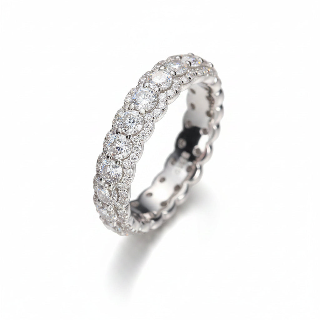 Silver ring with moissanites on a white background