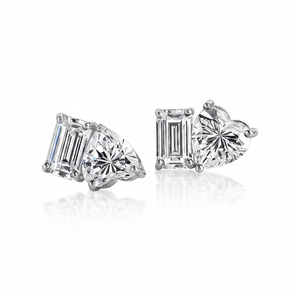Pair of diamond earrings on a white background