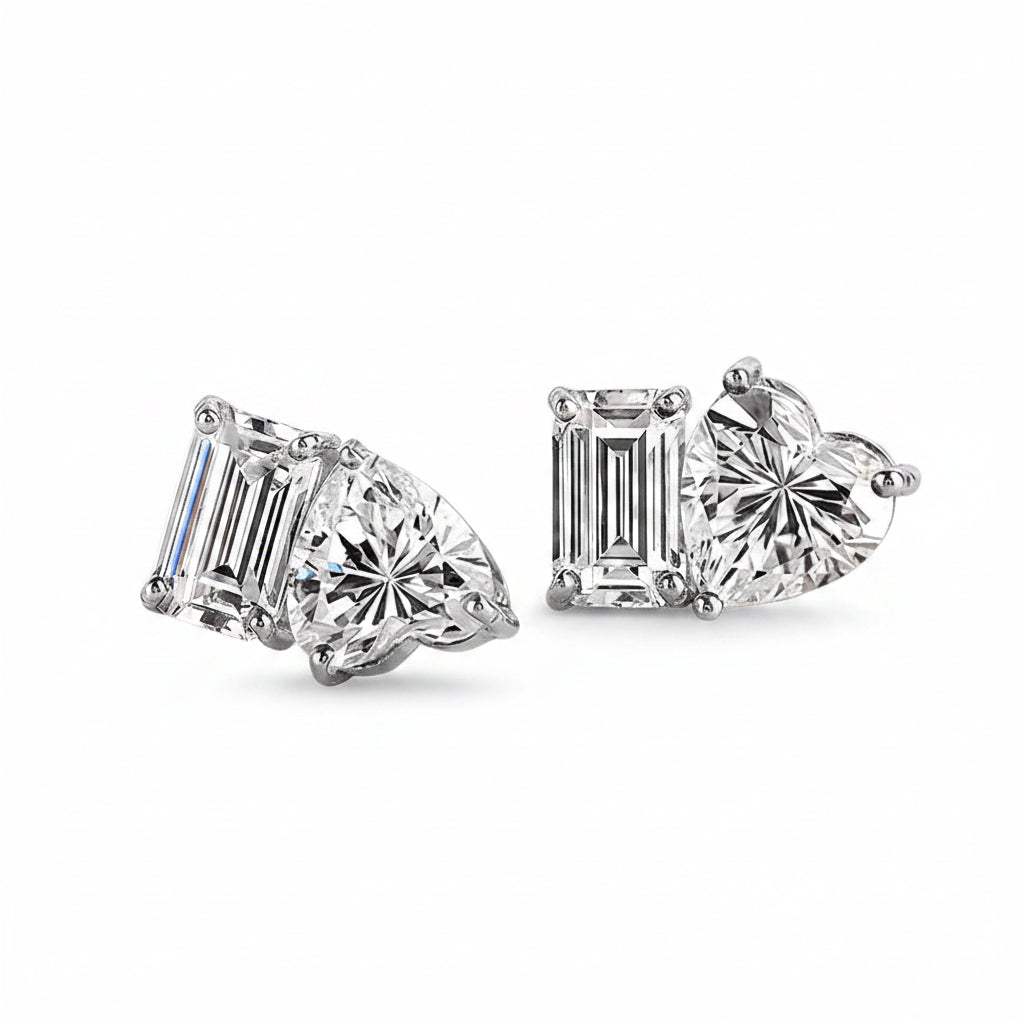 Pair of diamond earrings on a white background