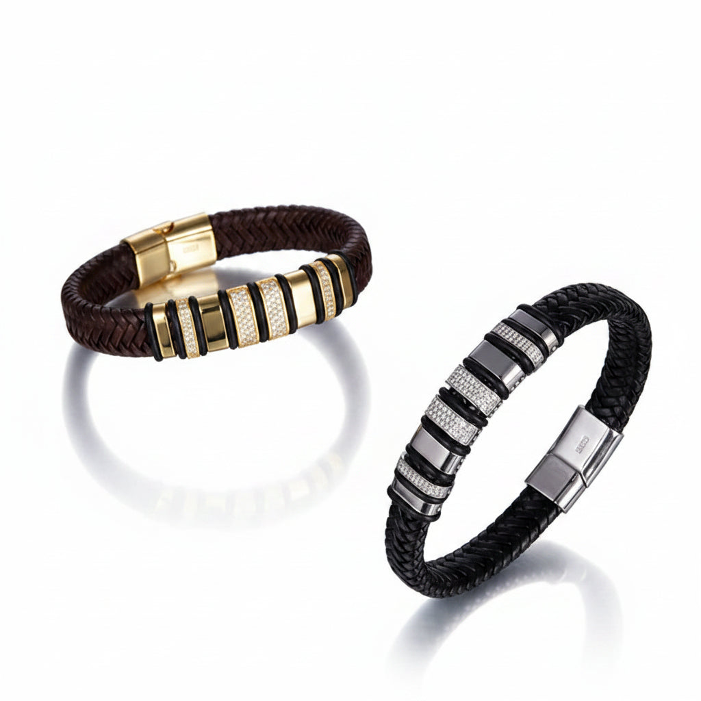 Two leather bracelets with metal accents on a white background