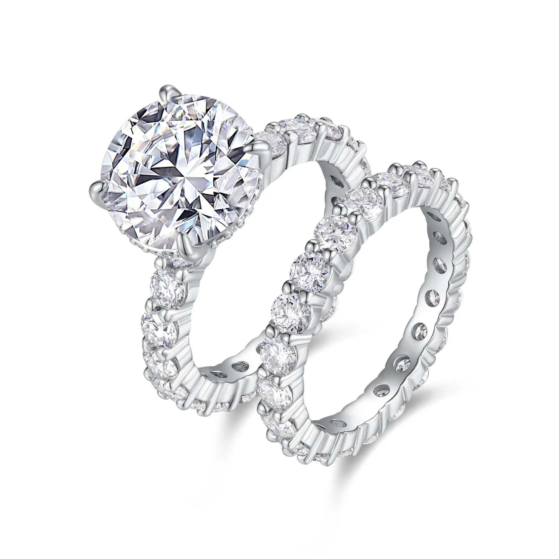 Moissanite ring set on a white background