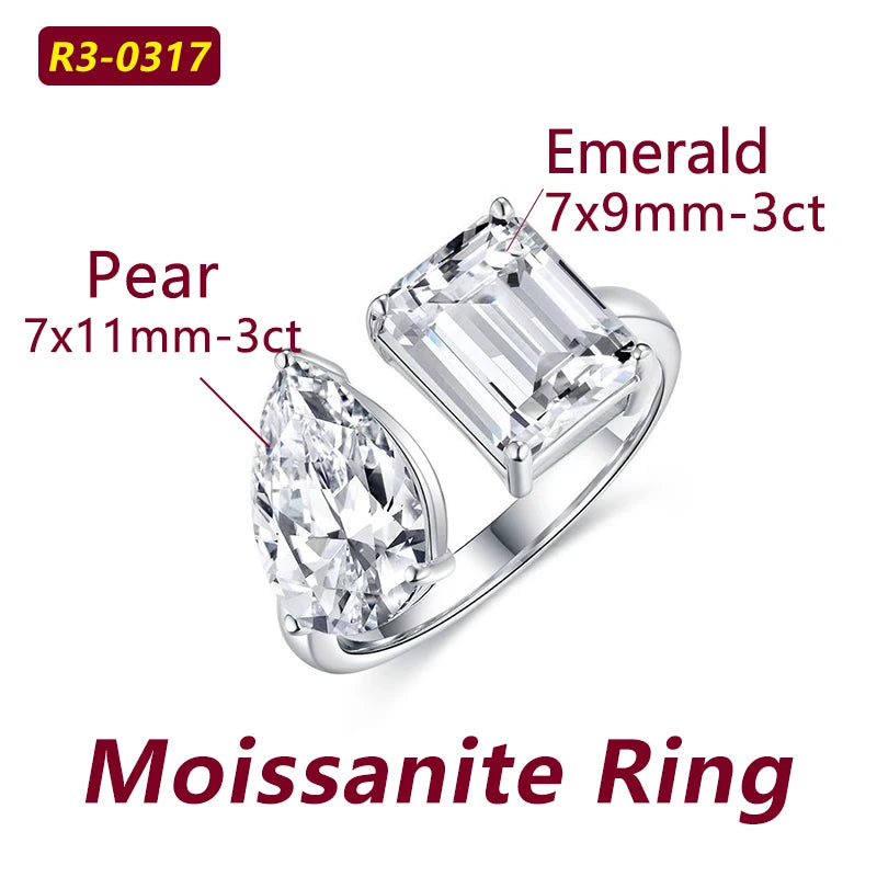 Moissanite ring with pear and emerald cut stones on a white background