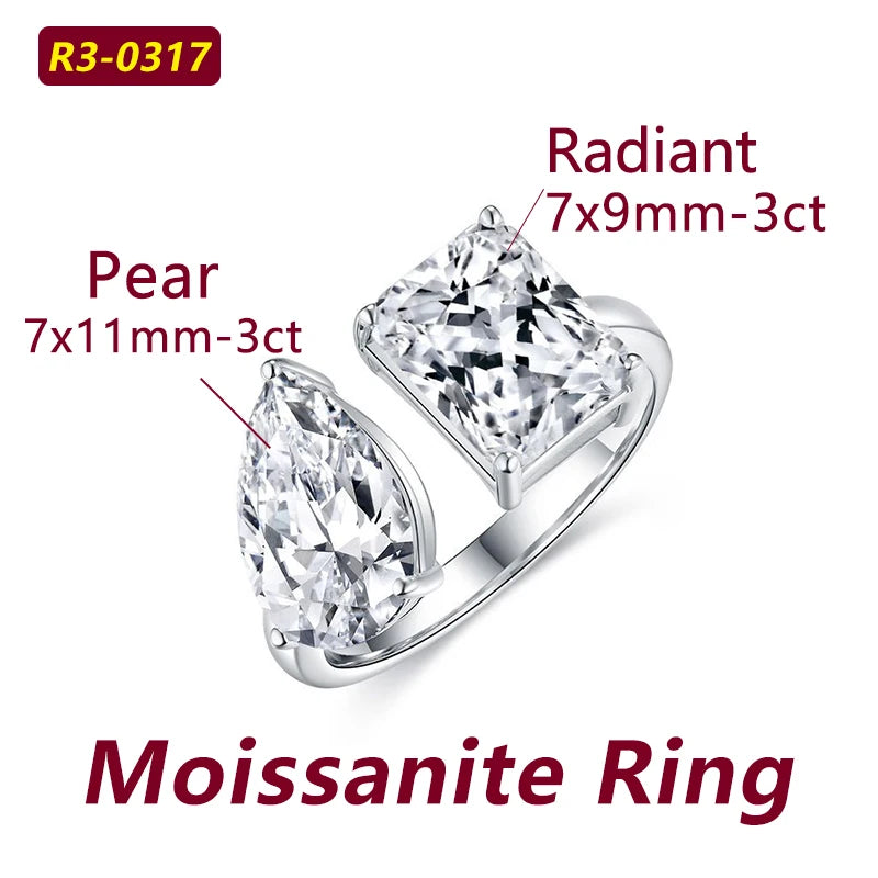 Moissanite ring with pear and radiant cut stones on a white background