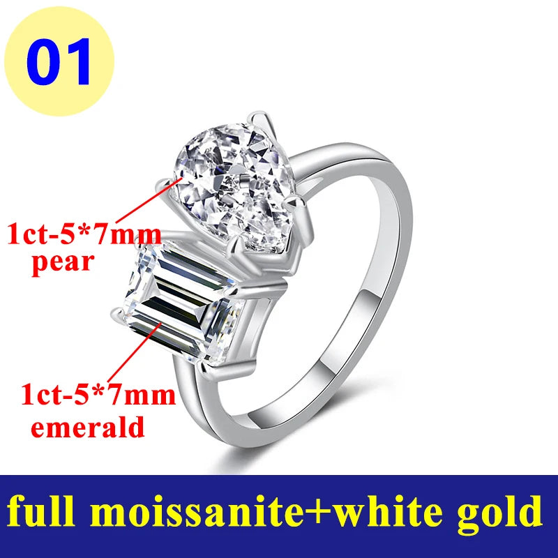 Silver ring with heart-shaped and emerald-cut gemstones on a white background
