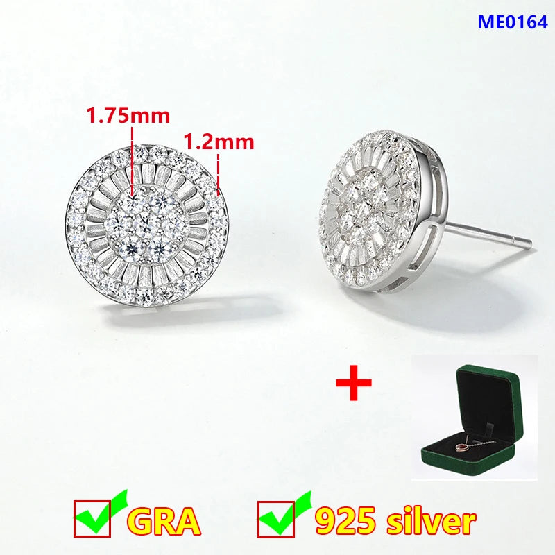 Silver earrings with measurements and a green box on a white background