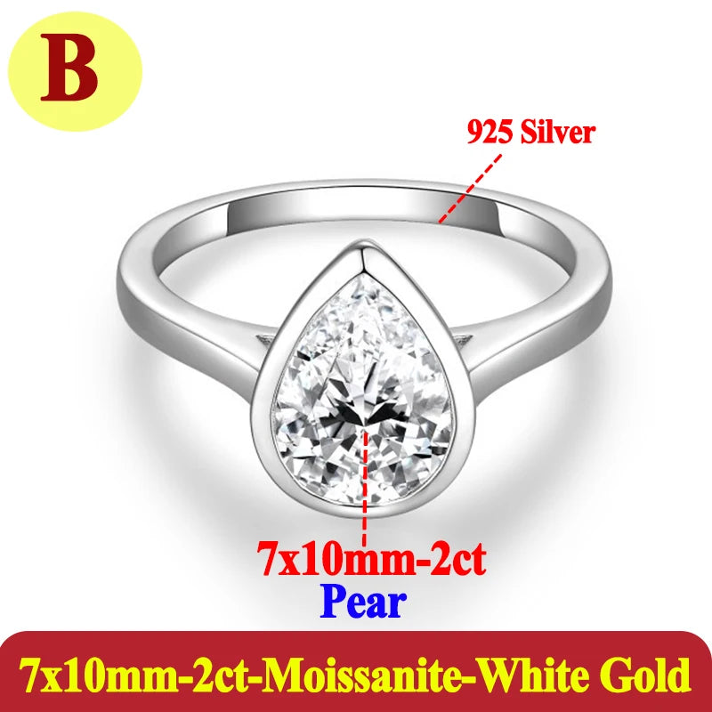Silver ring with pear-shaped gemstone on a white background