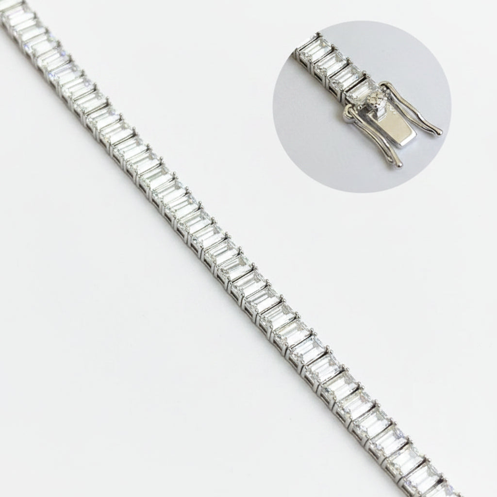 Silver bracelet with baguette-cut moissanite diamonds on a white background