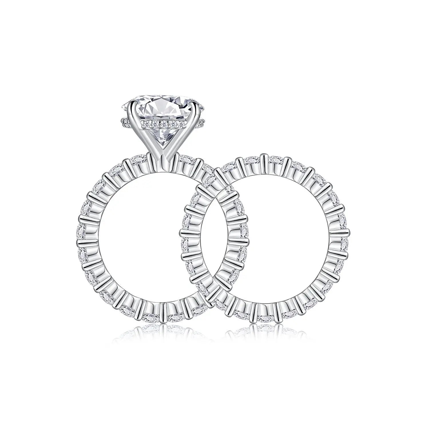 Moissanite ring with two interlocking hoop earrings on a white background