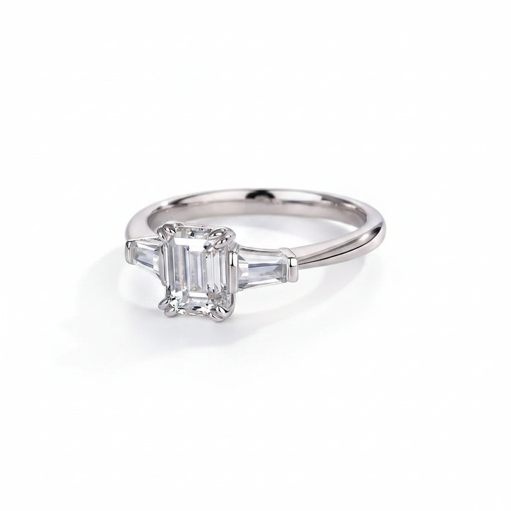 Silver ring with a diamond on a white background