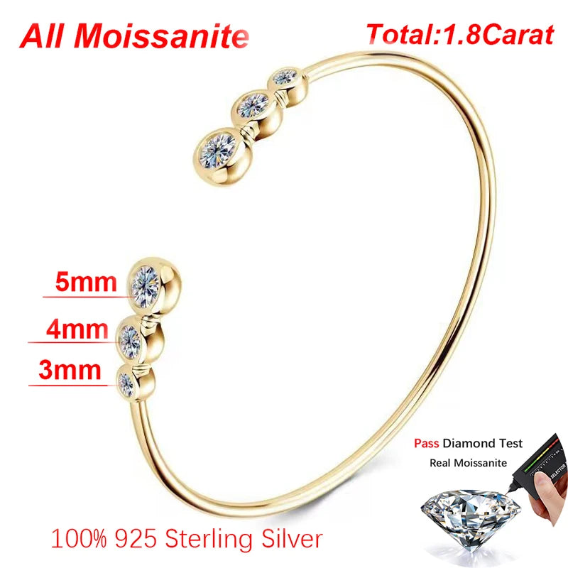 Gold bracelet with moissanite stones on a white background