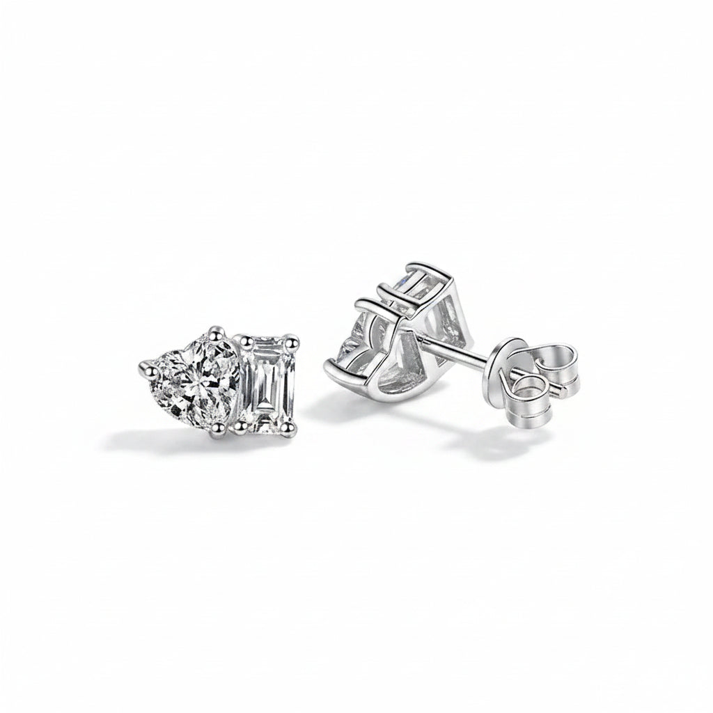 Silver stud earrings on a white background