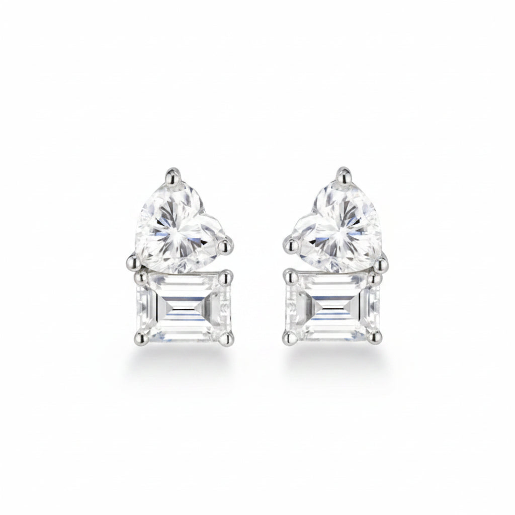 Pair of diamond stud earrings on a white background