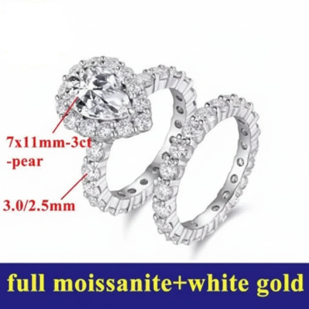 Silver ring with gemstone details on a white background