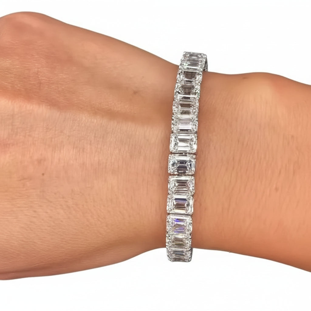 Moissanite diamond bracelet on a person's wrist with a white background