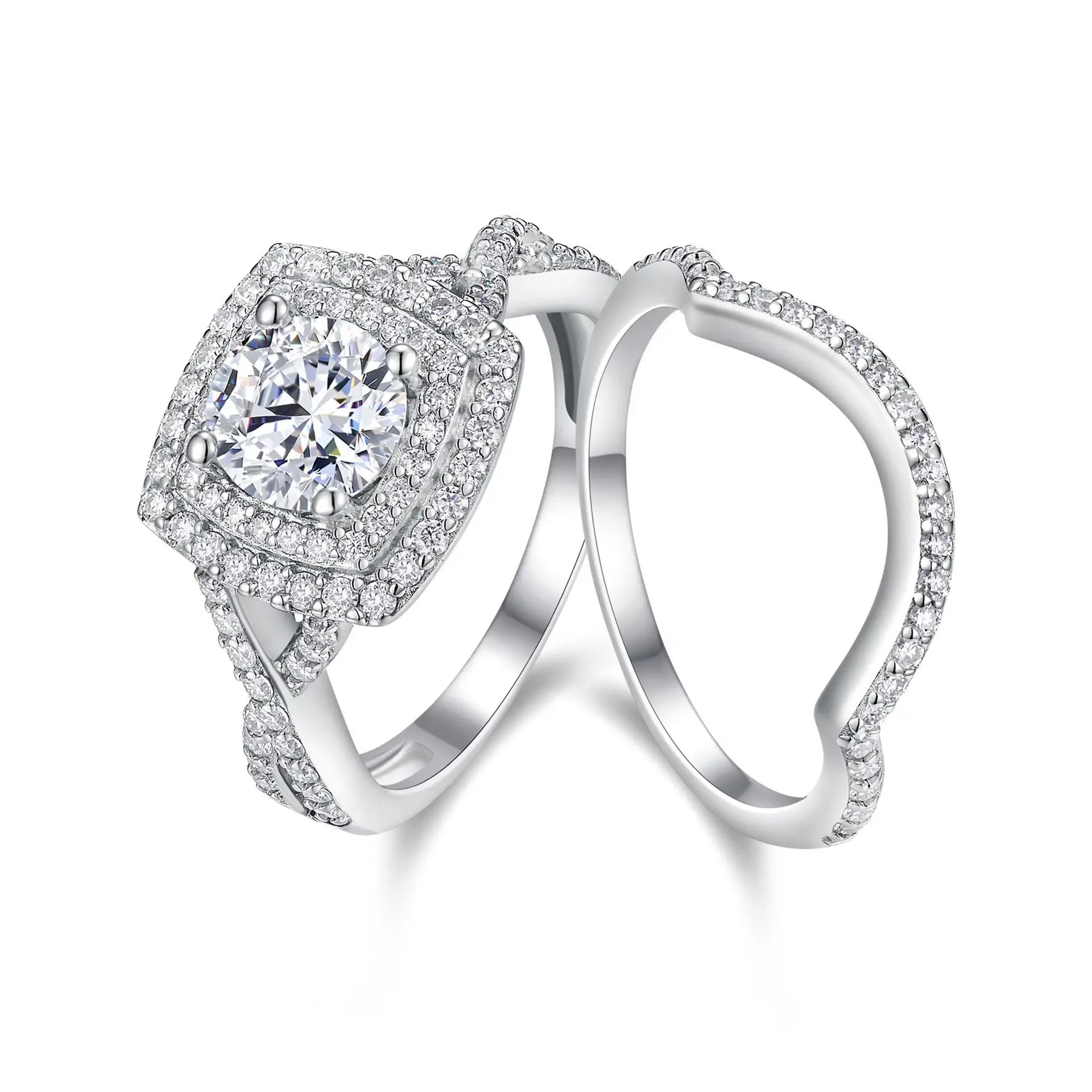 Silver ring with a large central moissanite gemstone and smaller stones on a white background