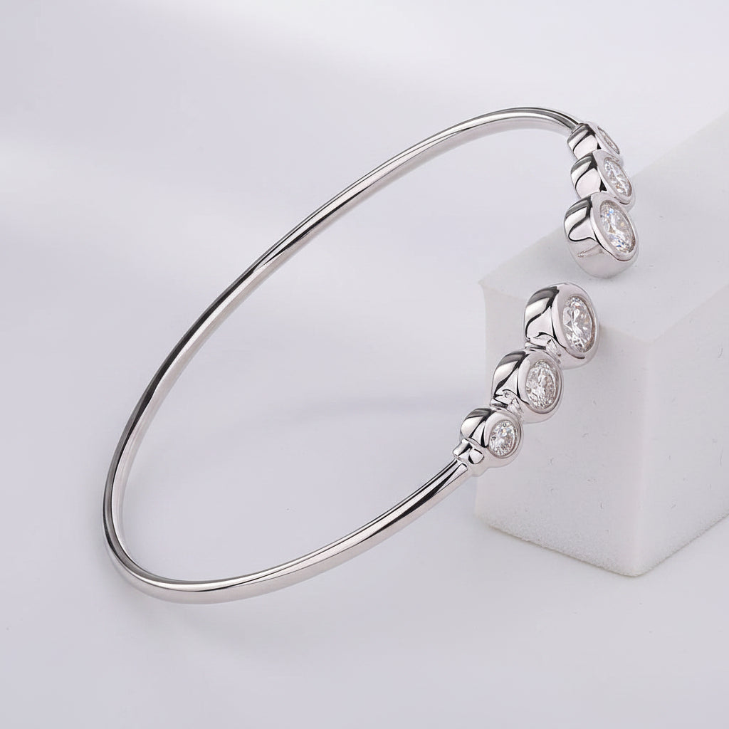 Silver bracelet with gemstones on a neutral background