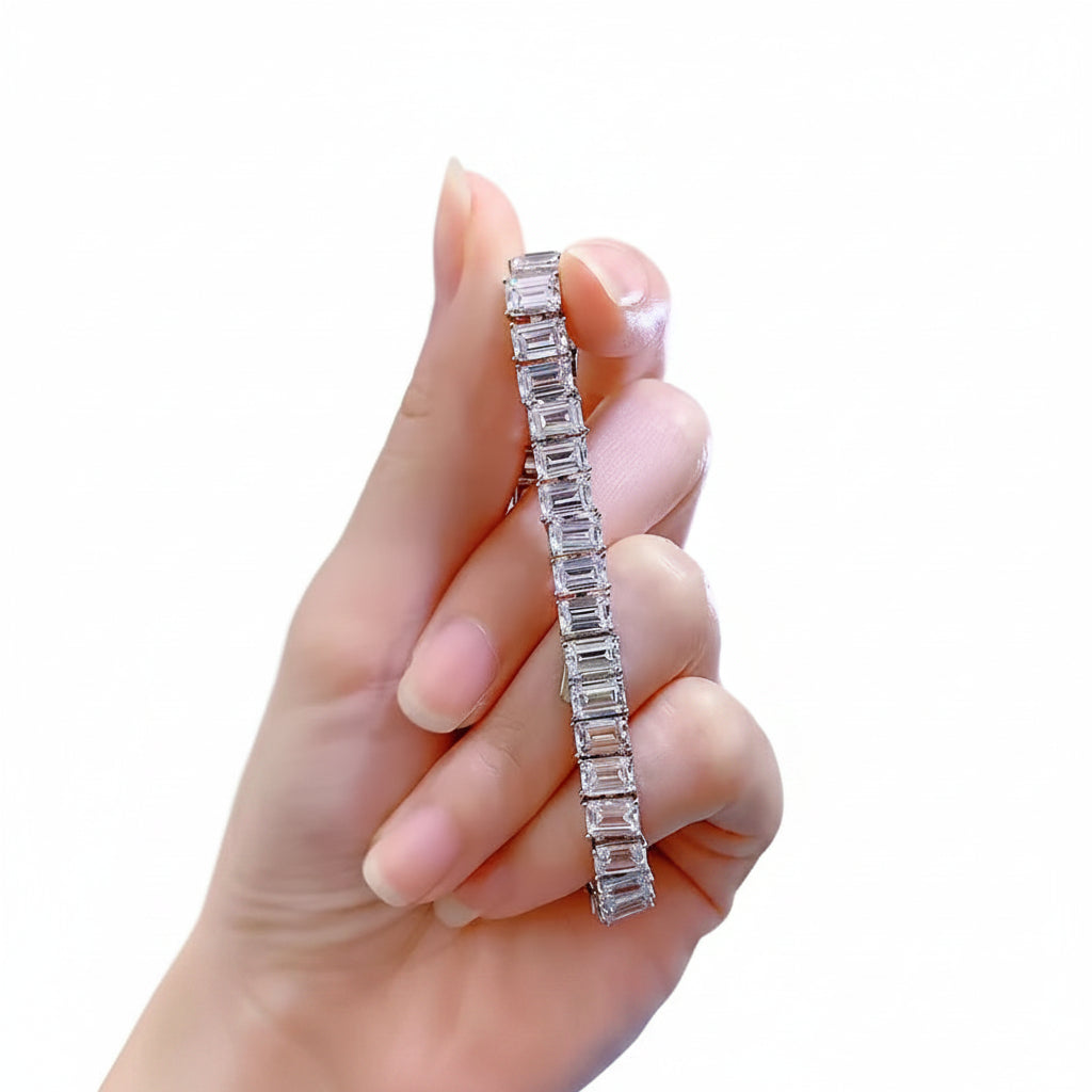 Moissanite diamond bracelet held in a hand 